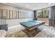 Resident game room with sleek ping pong table, modern design, and bright window at 100 1St N Ave # 3104, St Petersburg, FL 33701