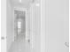 Bright hallway leading to bathroom with modern finishes and neutral tones at 100 1St N Ave # 3104, St Petersburg, FL 33701