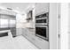 Modern kitchen with stainless steel appliances, built-in oven, and sleek design at 100 1St N Ave # 3104, St Petersburg, FL 33701