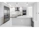Elegant kitchen with stainless steel fridge, modern cabinetry, and marble countertops at 100 1St N Ave # 3104, St Petersburg, FL 33701
