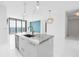 Chic kitchen with marble island, stainless steel appliances, and pendant lighting at 100 1St N Ave # 3104, St Petersburg, FL 33701