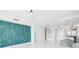 Bright modern living room featuring blue accent wall at 100 1St N Ave # 3104, St Petersburg, FL 33701