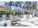 Modern outdoor lounge area with comfortable seating and shaded cabanas amid lush landscaping at 100 1St N Ave # 3104, St Petersburg, FL 33701