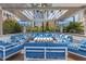 Inviting outdoor lounge area features comfortable seating, a pergola, and a view of the city skyline at 100 1St N Ave # 3104, St Petersburg, FL 33701