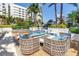 Stylish outdoor seating with a modern fire pit offers a cozy space for relaxation and conversation at 100 1St N Ave # 3104, St Petersburg, FL 33701