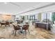Open lounge area with modern furnishings, bar, and water views at 100 1St N Ave # 3104, St Petersburg, FL 33701