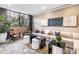 Stylish resident lounge with chic seating, modern artwork, and large windows at 100 1St N Ave # 3104, St Petersburg, FL 33701