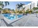 Inviting pool area with lounge chairs and tropical landscaping. The perfect spot to relax at 100 1St N Ave # 3104, St Petersburg, FL 33701