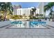 Stunning pool area with palm trees and city views, perfect for relaxation at 100 1St N Ave # 3104, St Petersburg, FL 33701