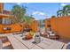 Charming courtyard with flagstone and brick pavers, a dining set, and a fountain at 1008 Mandalay Ave, Clearwater, FL 33767