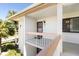 Exterior view of the condo featuring a private balcony and a welcoming entrance at 108 Lakeview Ct # 108, Oldsmar, FL 34677