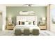 A main bedroom suite featuring a neutral palette, soft textures, and comfortable furnishings at 10823 Fort White Ct, Tampa, FL 33647