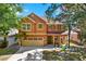 Charming two-story home featuring a well-maintained front yard with decorative landscaping and a welcoming entrance at 11118 Running Pine Dr, Riverview, FL 33569
