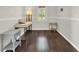 Bright home office with hardwood floors, desk, and window view at 11118 Running Pine Dr, Riverview, FL 33569