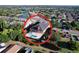 Aerial view of the home with fenced backyard, pool, and lush landscaping at 11535 Wellman Dr, Riverview, FL 33578
