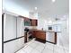 Well-equipped kitchen with stainless steel appliances and ample cabinet space at 11535 Wellman Dr, Riverview, FL 33578