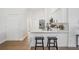 Open-concept kitchen boasts modern countertops, a breakfast bar, and stainless steel appliances at 11639 Sunshine Pond Rd, Tampa, FL 33635