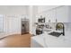 Well-lit kitchen features white cabinets, stainless steel appliances, and light countertops at 11639 Sunshine Pond Rd, Tampa, FL 33635