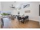 Bright living room with high ceilings, lake views, and modern furnishings perfect for entertaining at 11639 Sunshine Pond Rd, Tampa, FL 33635