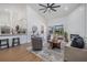 Stylish living room with lake views, modern furniture, and convenient access to the kitchen at 11639 Sunshine Pond Rd, Tampa, FL 33635