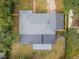 Aerial view of the home showing the roof and surrounding landscape at 1205 E Hamilton Ave, Tampa, FL 33604