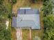 Birds eye view of the home showing the roof and surrounding yard at 1205 E Hamilton Ave, Tampa, FL 33604