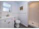 Updated bathroom featuring a walk-in shower and a new vanity at 1205 E Hamilton Ave, Tampa, FL 33604