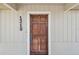 Close-up of the front door of the residence, showcasing the house number 1219 at 1219 Michigan N Dr, Dunedin, FL 34698
