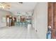 Open concept living space that features a seamless transition to the kitchen with a breakfast bar at 1219 Michigan N Dr, Dunedin, FL 34698
