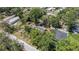 Aerial view of home showcasing its private lot surrounded by mature trees and green spaces at 12302- Pittsfield Ave, Tampa, FL 33624