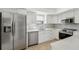 Well-appointed kitchen with stainless appliances, bright cabinetry, and lots of counter space at 13602 Frigate Ct # N201, Clearwater, FL 33762