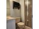 Bathroom featuring shower, toilet, and sink at 14061 Notreville Way, Tampa, FL 33624