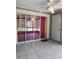 Screened lanai with tile flooring perfect for outdoor relaxation at 14061 Notreville Way, Tampa, FL 33624