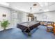 Community billiards room featuring a pool table and comfortable seating at 14255 Rosemary Ln # 8219, Largo, FL 33774