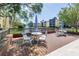 Exterior view from deck offering lake views, fountain, and comfortable seating areas at 14255 Rosemary Ln # 8219, Largo, FL 33774