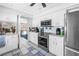 Community kitchen featuring modern appliances, countertops, and views into the multi purpose room at 14255 Rosemary Ln # 8219, Largo, FL 33774