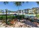 Exterior view of a well-manicured recreational area with shuffleboard and picnic area at 14255 Rosemary Ln # 8219, Largo, FL 33774