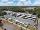 Aerial view of the condominium community with private backyards and mature landscaping at 1655 S Highland Ave # C155, Largo, FL 33756