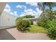 Backyard showcasing lush greenery and a tropical feel at 1655 S Highland Ave # C155, Largo, FL 33756