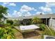 Landscaped backyard with a hammock for relaxation at 1655 S Highland Ave # C155, Largo, FL 33756