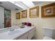 Clean bathroom featuring a modern sink and vanity, mirror, and plenty of space at 1655 S Highland Ave # C155, Largo, FL 33756