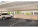 Designated covered parking near the home's exterior at 1655 S Highland Ave # C155, Largo, FL 33756