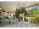 Covered patio that opens to the backyard and garden at 1655 S Highland Ave # C155, Largo, FL 33756
