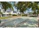 Exterior shot of the shuffleboard courts with the condominium buildings in the background at 1655 S Highland Ave # C155, Largo, FL 33756