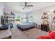 Bedroom featuring neutral walls, carpeted floor, fan and overhead LED lighting at 1725 Sommarie Way, Tarpon Springs, FL 34689