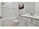This bathroom features white subway tile in the shower and a quartz countertop at 17652 Ramble On Way, Land O Lakes, FL 34638