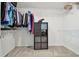 Spacious walk-in closet with ample shelving, storage cubes and hanging space for organized living at 17652 Ramble On Way, Land O Lakes, FL 34638