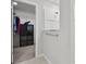 Organized walk-in closet with shelving, rods, and storage solutions for clothes and accessories at 17652 Ramble On Way, Land O Lakes, FL 34638