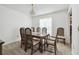 The dining room features a chandelier over a table with seating for six at 2204 Jennifer Ln, Valrico, FL 33594