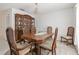 A dining room featuring a decorative hutch and table with seating at 2204 Jennifer Ln, Valrico, FL 33594